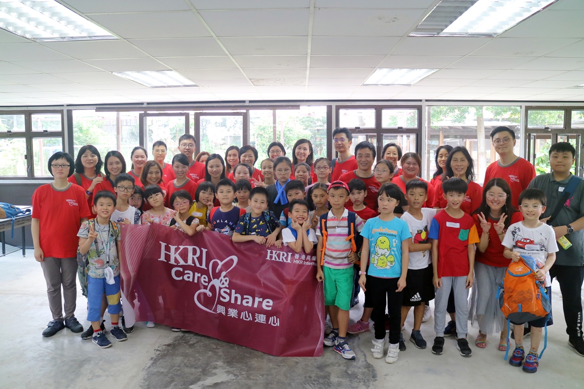 HKRI Care and Share Volunteers and Children Try their Hand at Making Traditional Snacks